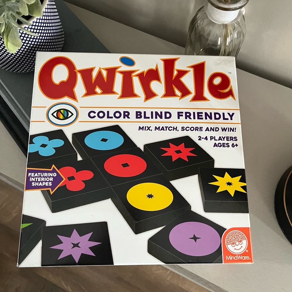 Qwirkle board game. Still in packaging. Never used.